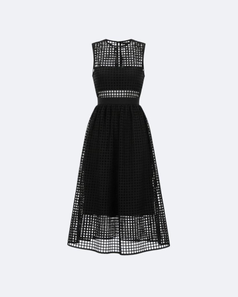 Black dress with a grid pattern on a light gray background