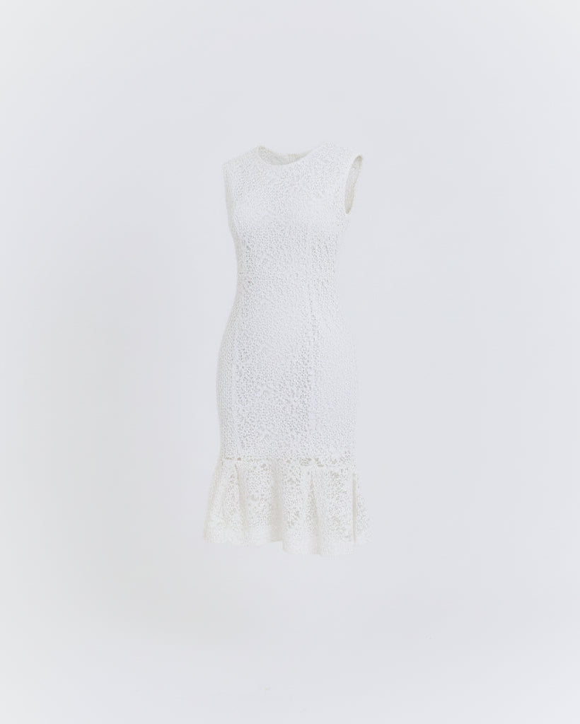 White lace dress on a light gray background