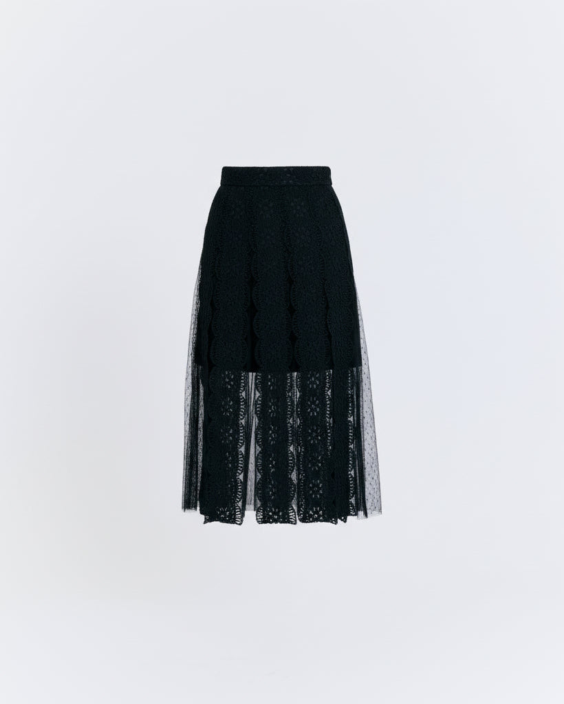 Black skirt with lace detailing on a white background