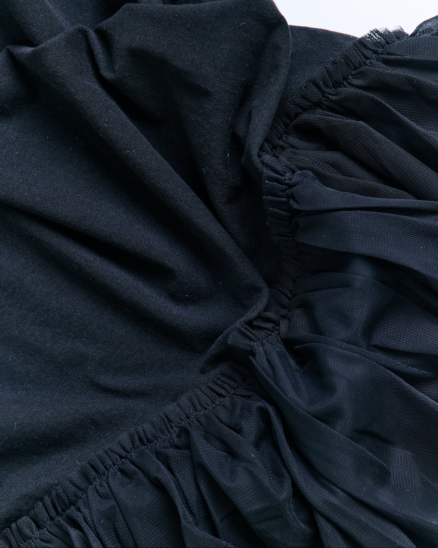 Close-up of dark blue fabric with a textured texture.