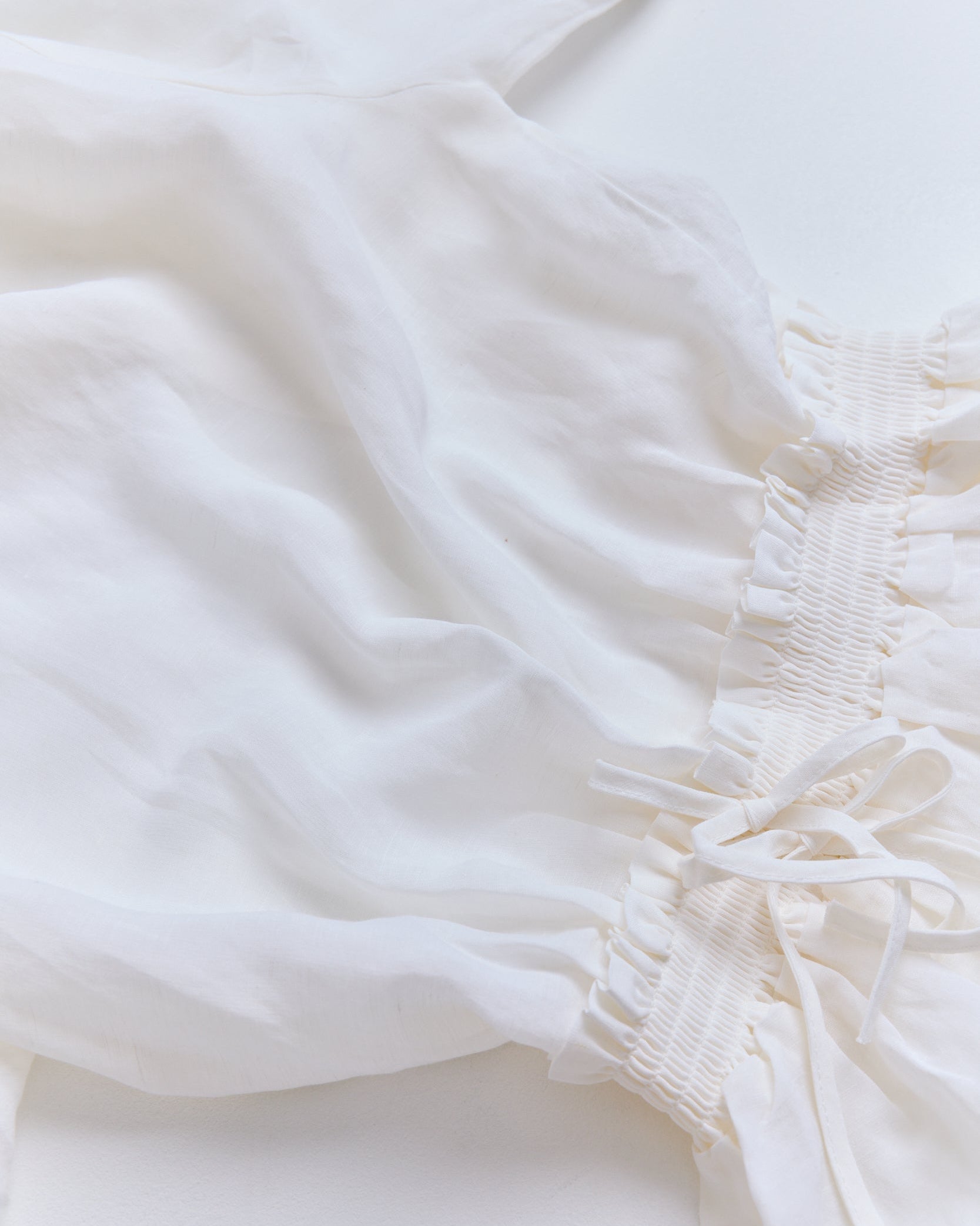 Airy Peplum Drawstring Top (White)